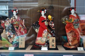 Stunning dolls on display in a very expensive souvenir shop window.